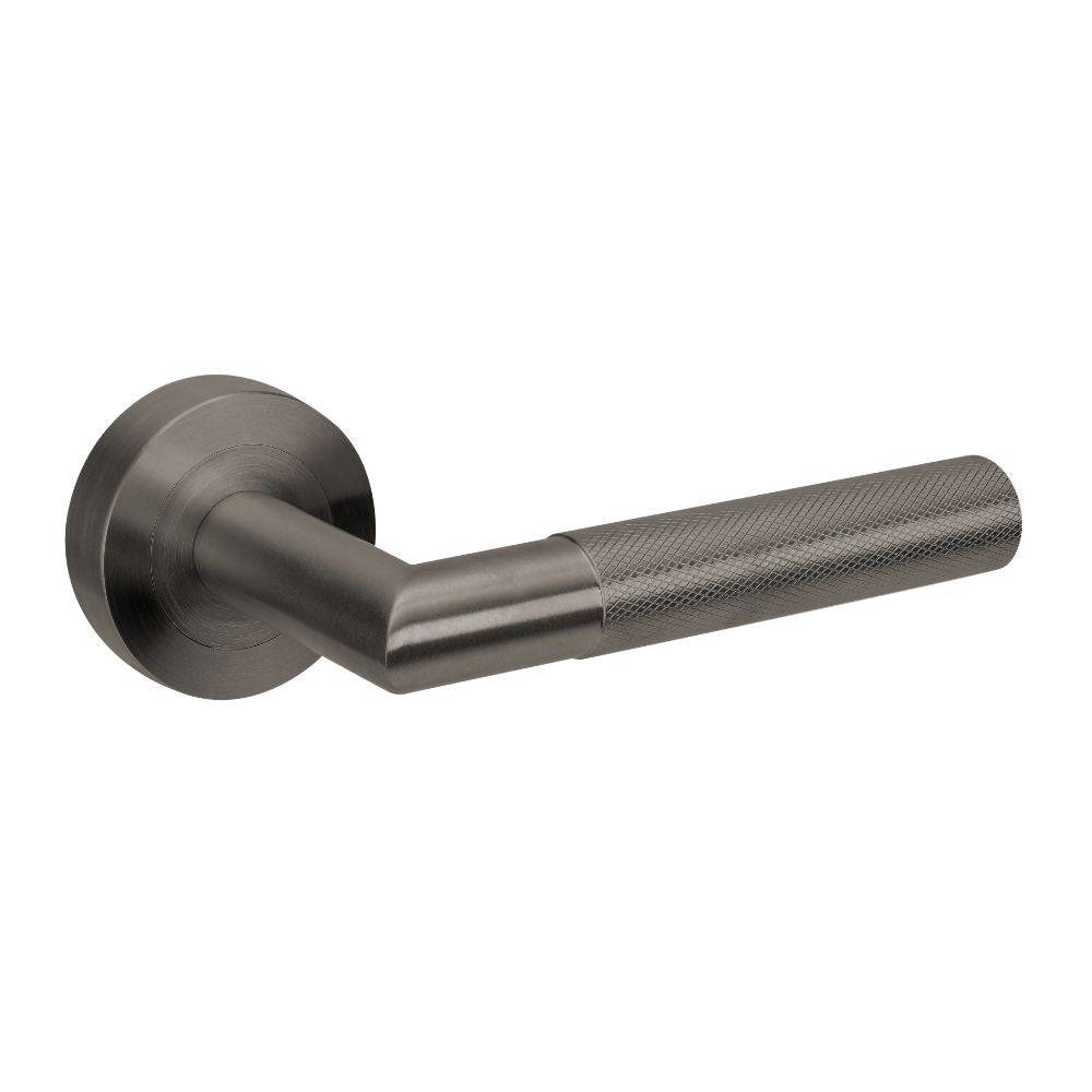 Vertex Integrated Privacy Set gn featuring a sleek, modern lever handle with a textured grip in a gunmetal finish, ideal for interior doors.